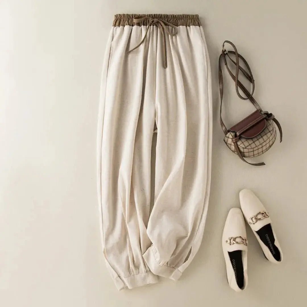 Lniane spodnie damskie – luźny krój, regulowane mankiety - Arkadya Outlet - Women Pants