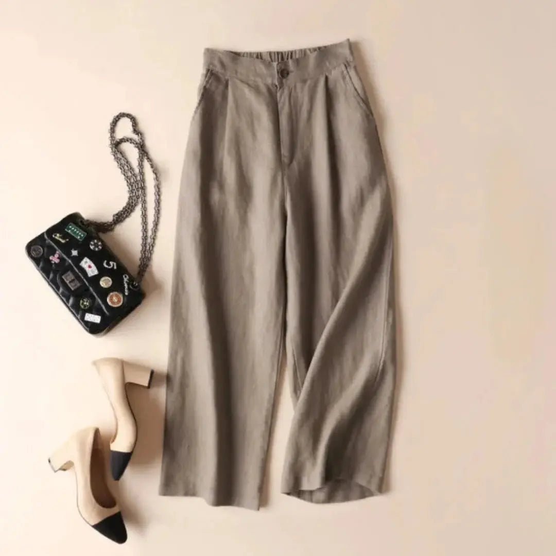 Lniane spodnie damskie z wysokim stanem – plisy i kieszenie - Arkadya Outlet - Women Pants