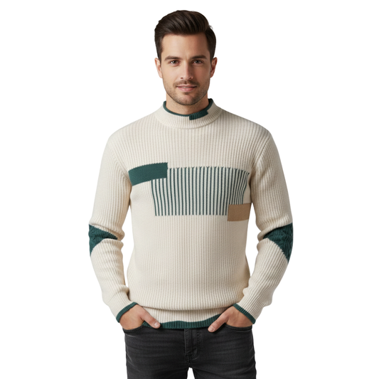 Mężczyzna o krótkich ciemnych włosach pozuje z rękami w kieszeniach, ubrany w ciemne dżinsy i Arkadya Outlet Sweter męski wysoki kołnierz geometryczny wzór konstrukcja. Patrzy bezpośrednio w kamerę.