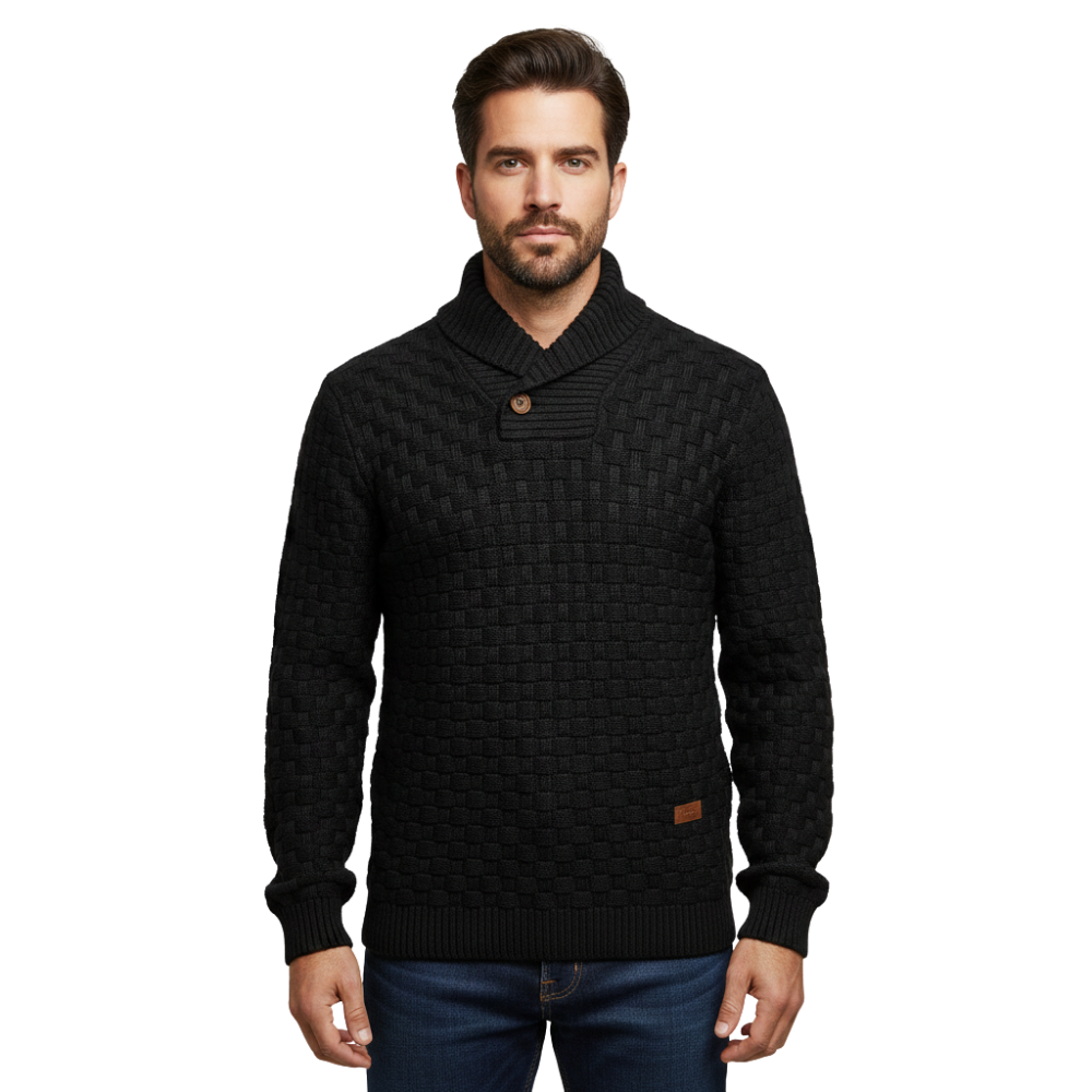 Mężczyzna z krótkimi brązowymi włosami i brodą ma na sobie sweter męski Arkadya Outlet o teksturowanej powierzchni, regularny krój na zimę, w połączeniu z niebieskimi dżinsami, stojący na białym tle.