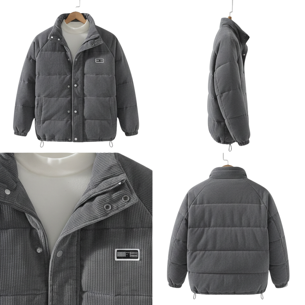 Kurtka zimowa męska strukturalny krój z czystymi liniami marki Arkadya Outlet ma szary sztruksowy wzór ze stójką, guzikami zatrzaskowymi, elastycznymi mankietami i naszywką na piersi. Prezentowana pod wieloma kątami na białym swetrze z golfem.