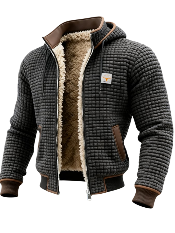 Arkadya Outlet Lekka Kurtka Pikowana Męska Luźny Krój Wysoki Kołnierz to stylowa czarna kurtka pikowana męska z brązowymi wykończeniami, puszystą beżową podszewką, kapturem, zapięciem na suwak, bocznymi kieszeniami, wysokim kołnierzem i naszywką na piersi.