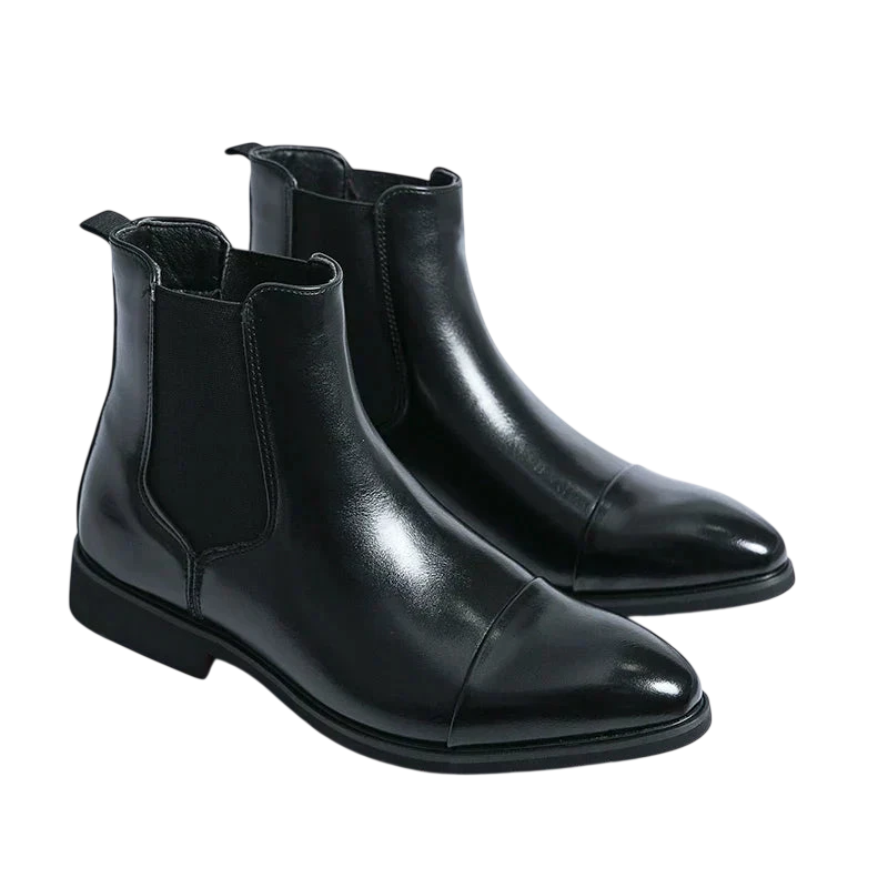 Botki Chelsea Męskie Antypoślizgowa Zamknięta Konstrukcja marki Arkadya Outlet: czarne, skórzane, z elastycznymi panelami, lekkim połyskiem i niskim obcasem na zimę, prezentowane na białym tle.