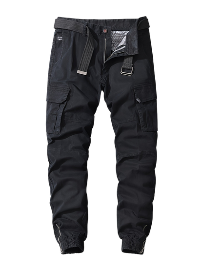 Arkadya Outlet Męskie Spodnie joggery z elastycznymi mankietami i kieszeniami cargo, pokazane na płasko z otwartym pasem odsłaniającym wewnętrzną podszewkę, wyświetlane na gładkim szarym tle.