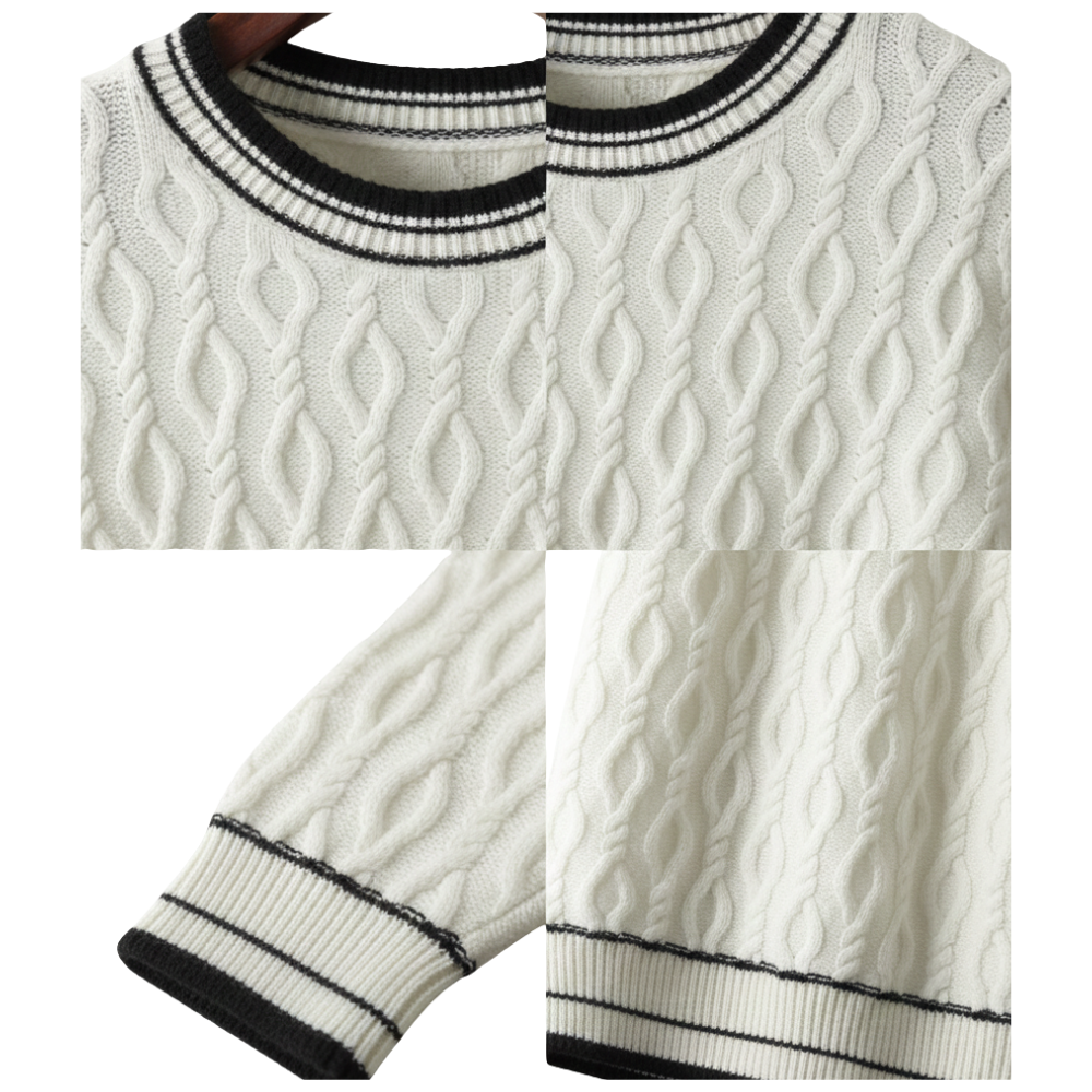 Zbliżenie na męski dekolt Sweter okrągły kontrastowa lamówka marki Arkadya Outlet z wyraźną teksturowaną dzianiną z czarno-białym prążkowanym kołnierzem, mankietami i rąbkiem. Strukturalny splot warkoczowy jest wyraźnie widoczny.