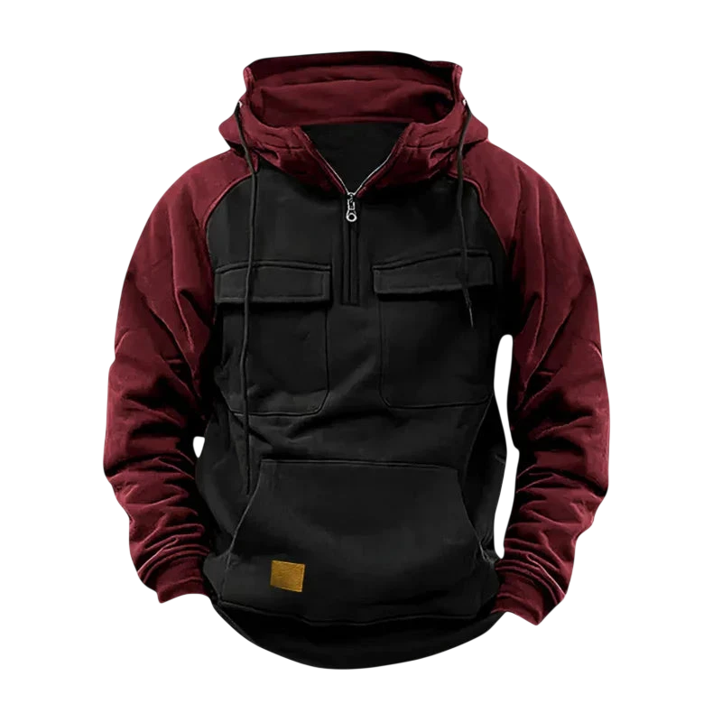 Arkadya Outlet Męska Bluza to dwukolorowa bluza z kapturem z czarnym korpusem, bordowymi rękawami i kapturem, pół-zamkiem z przodu, dwiema kieszeniami na piersi i dużą przednią kieszenią z małą brązową naszywką.