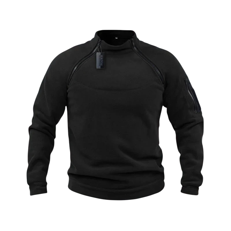 Bluza męska polarowa długi rękaw z kieszeniami marki Arkadya Outlet w kolorze czarnym, z suwakami na ramionach i ramionach, jest prezentowana na rozmytym górskim tle. Bluza pokazana jest bez widocznego użytkownika.