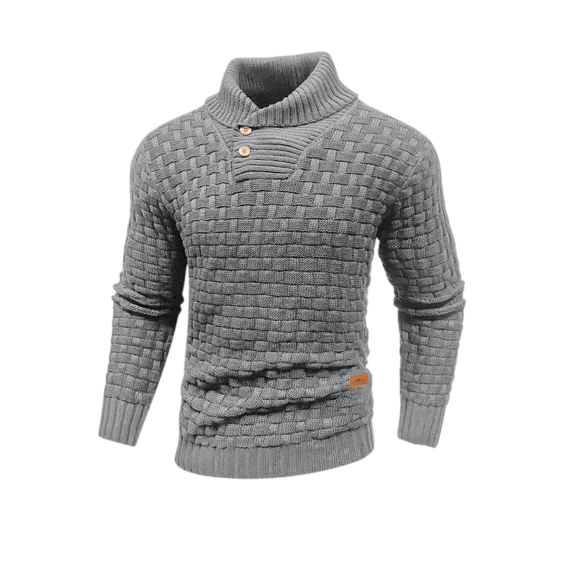 Sweter męski Arkadya Outlet o teksturowanej powierzchni, regularnym kroju i z kołnierzem szalowym. Idealny na zimę, w odcieniu szarości, z dwoma guzikami przy szyi - prezentowany na jasnoszarym tle.