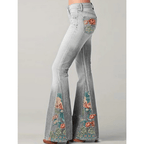 Jeansy damskie dzwony z haftem kwiatowym - Arkadya Outlet - Women Pants