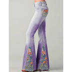 Jeansy damskie dzwony z haftem kwiatowym - Arkadya Outlet - Women Pants