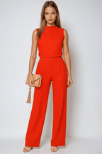 Kombinezon damski bez rękawów z szerokimi nogawkami i dekoltem stójka - Arkadya Outlet - Women Jumpsuit