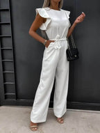 Kombinezon damski elegancki z dekoltem na jedno ramię – długie nogawki, asymetryczny krój - Arkadya Outlet - Women Jumpsuit