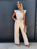 Kombinezon damski elegancki z dekoltem na jedno ramię – długie nogawki, asymetryczny krój - Arkadya Outlet - Women Jumpsuit