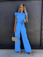 Kombinezon damski elegancki z dekoltem na jedno ramię – długie nogawki, asymetryczny krój - Arkadya Outlet - Women Jumpsuit