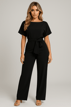 Kombinezon damski elegancki z paskiem w talii – szerokie nogawki, jednoczęściowy krój - Arkadya Outlet - Women Jumpsuit