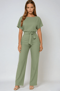 Kombinezon damski elegancki z paskiem w talii – szerokie nogawki, jednoczęściowy krój - Arkadya Outlet - Women Jumpsuit