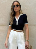 Koszulka polo damska z kokardą z przodu - Arkadya Outlet - Women Shirt
