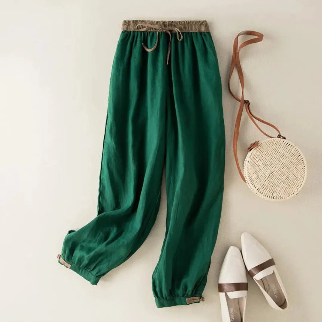 Lniane spodnie damskie – luźny krój, regulowane mankiety - Arkadya Outlet - Women Pants