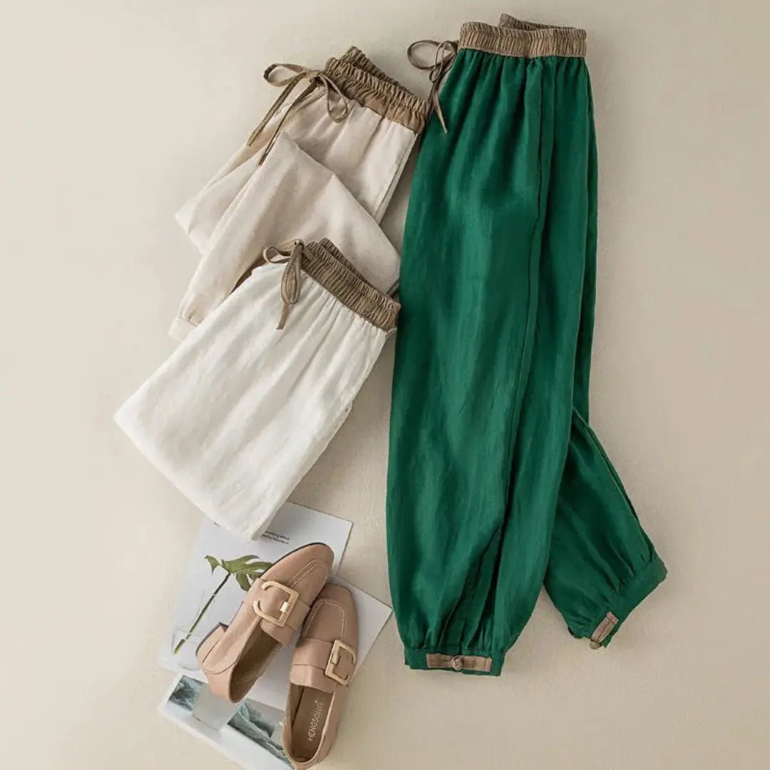 Lniane spodnie damskie – luźny krój, regulowane mankiety - Arkadya Outlet - Women Pants