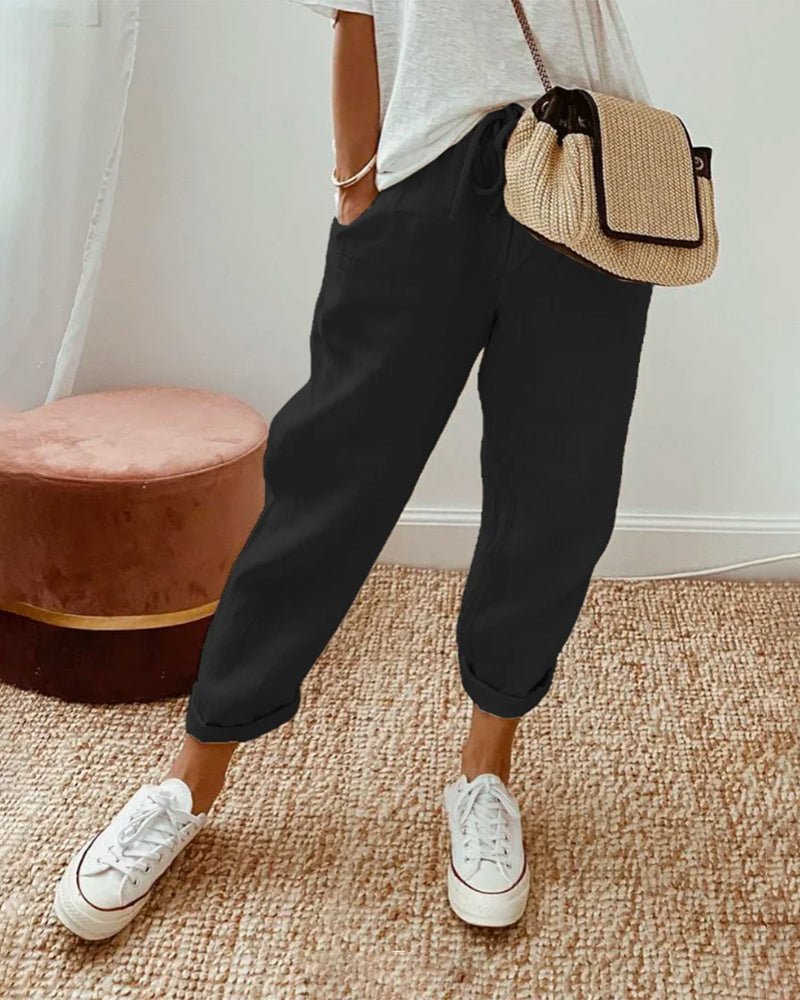 Lniane spodnie damskie – luźny krój, wiązany pas - Arkadya Outlet - Women Pants