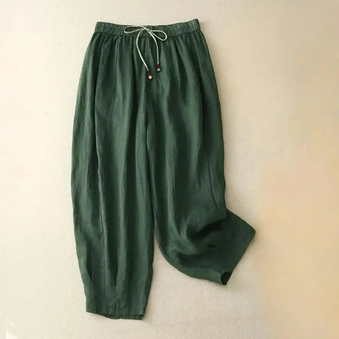 Lniane spodnie damskie – luźny krój, zwężana nogawka, kieszenie - Arkadya Outlet - Women Pants
