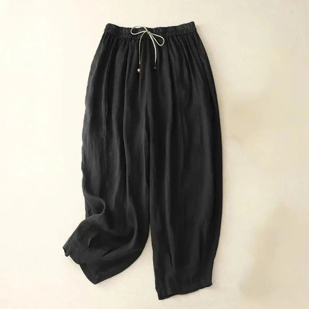 Lniane spodnie damskie – luźny krój, zwężana nogawka, kieszenie - Arkadya Outlet - Women Pants
