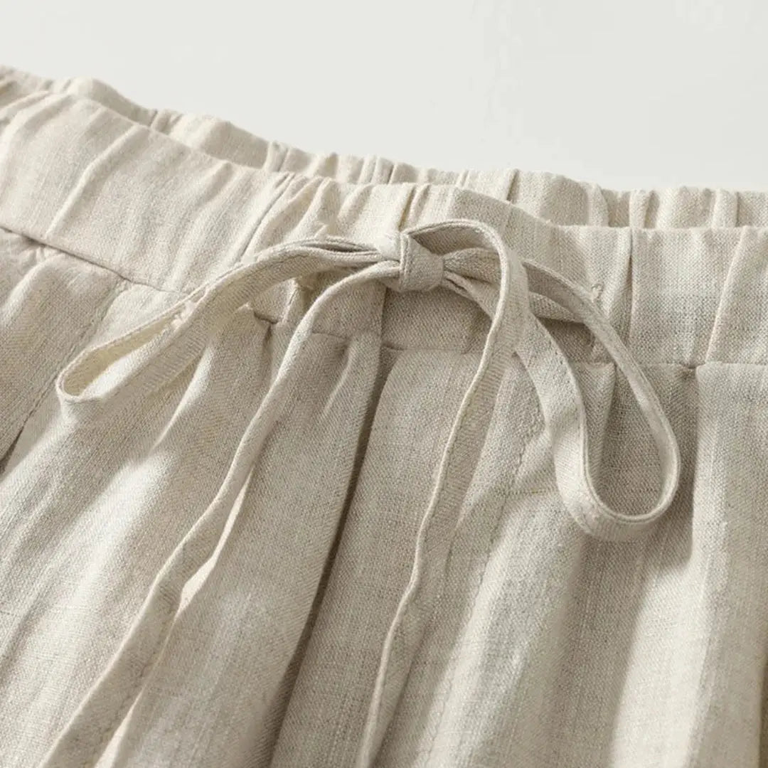 Lniane spodnie damskie – szeroka nogawka, wiązanie w pasie - Arkadya Outlet - Women Pants