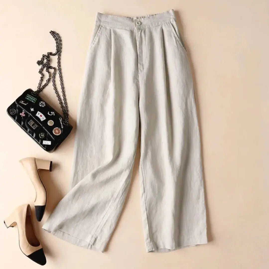 Lniane spodnie damskie z wysokim stanem – plisy i kieszenie - Arkadya Outlet - Women Pants