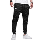 Spodnie joggerowe męskie krój slim ze ściągaczem w pasie i mankietach - Arkadya Outlet - Men Pants