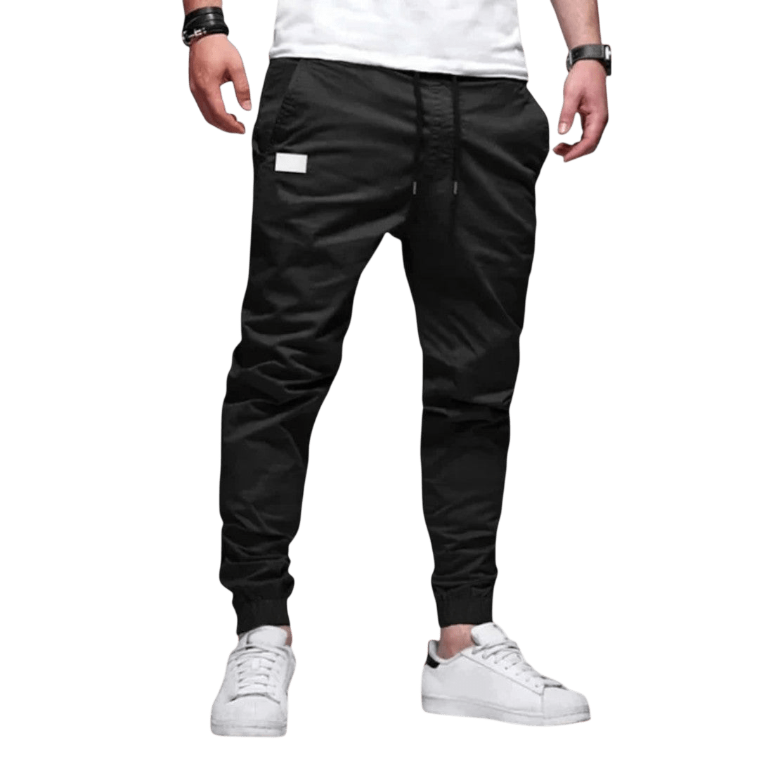 Spodnie joggerowe męskie krój slim ze ściągaczem w pasie i mankietach - Arkadya Outlet - Men Pants