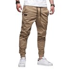 Spodnie joggerowe męskie krój slim ze ściągaczem w pasie i mankietach - Arkadya Outlet - Men Pants