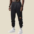 Spodnie Męskie Dresowe | Zwężany Krój z Elastycznym Pasem - Arkadya Outlet - Trousers