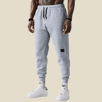 Spodnie Męskie Dresowe | Zwężany Krój z Elastycznym Pasem - Arkadya Outlet - Trousers