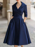 Sukienka A - line z kołnierzem i plisowaną talią - Arkadya Outlet - Women Midi Dress