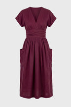 Sukienka midi z dekoltem V i kieszeniami - Arkadya Outlet - Women Midi Dress
