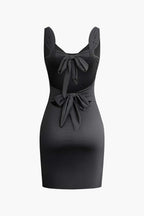 Sukienka mini bodycon z plisami i wiązaniem - Arkadya Outlet - Women Mini Dress
