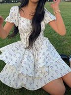 Sukienka mini w kwiaty z gorsetem i bufiastymi rękawami - Arkadya Outlet - Women Mini Dress