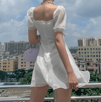 Sukienka z kryształowymi zdobieniami i dekoltem V - Arkadya Outlet - Women Mini Dress